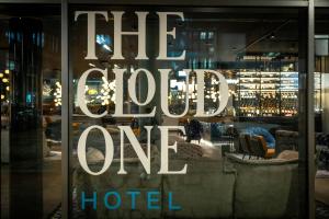 a store window with the words the chosen one hotel at The Cloud One Hamburg-Kontorhaus in Hamburg