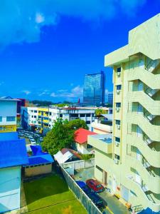 an aerial view of a city with buildings at New Palace Inn in Miri +25 photos