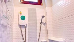a bathroom with a shower and a toilet in it at Abbas House by Swiss Chalet, 2-room Cottages in Krabi +26 photos