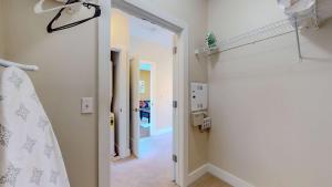 a hallway with a door leading into a room at Great Charming stay in Stamford