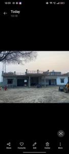 a picture of a building with at Mishthi singh homestay in Jalālpur Dhai