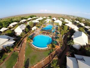an aerial view of a resort with two pools at Stunning Cable Beach - Unit in Cable Beach