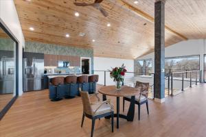 a kitchen and dining room with a table and chairs at Blue Hills Ranch in McGregor