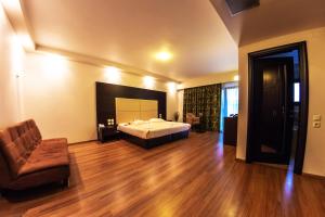 Postel nebo postele na pokoji v ubytování Giotis Boutique Hotel