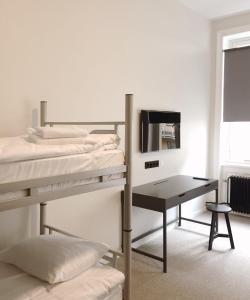 Postel nebo postele na pokoji v ubytování Hotel Hötorget
