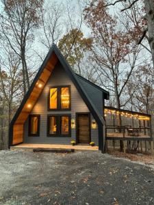 a small house with a gambrel roof at Eagles Rest in Murray