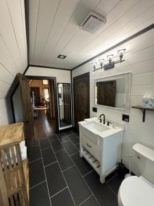a bathroom with a sink and a toilet at Eagles Rest in Murray +20 photos