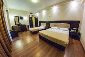 Postel nebo postele na pokoji v ubytování Giotis Boutique Hotel