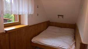 Postel nebo postele na pokoji v ubytování Chalupa Na Bucharu