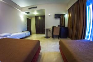 Postel nebo postele na pokoji v ubytování Giotis Boutique Hotel