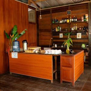 a kitchen with a counter and a counter top at Valencia Lake Lodge in Puerto Maldonado +42 photos