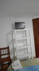 TV a/nebo společenská místnost v ubytování Pensió i Apartaments la Bordeta