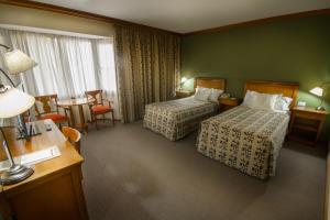 Cama ou camas em um quarto em Hotel Kosten Aike