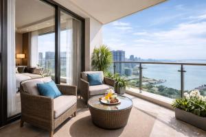 a hotel room with a view of the ocean at lucky hotel in Chandīgarh