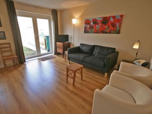 a living room with a couch and a table at New Bakery in Glanton