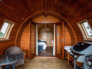 a room with an arched doorway with a bed and a bedroom at Now - Uk50567 in Port of Menteith