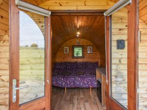 an inside view of a room in a wooden house at Willow - Glamping Pod - Uk49947 in Oswestry