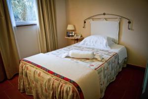 Letto o letti in una camera di Albergo La Primula