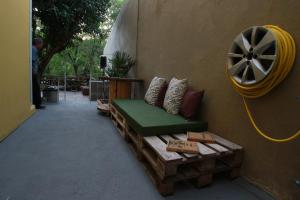 A patio or other outdoor area at Hangar Rio Hostel