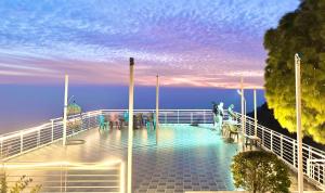 a deck of a cruise ship at sunset at Glamo home kasauli in Kasauli