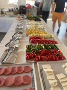 a long buffet of food on a table at Serge Otel in Arapkir