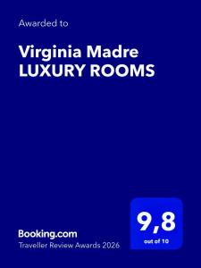 a blue screen with the words vyrnia made luxury rooms at Virginia Madre Boutique Guest House in San Benedetto del Tronto