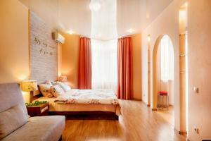 Postel nebo postele na pokoji v ubytování Apartment GreenHouse at Bazhova