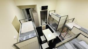 an overhead view of a room with several beds at Hostella in Salor Bekati