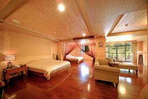 Postel nebo postele na pokoji v ubytování Dream Forest Villa