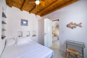 Giường trong phòng chung tại Aegean Colors Koufonisia