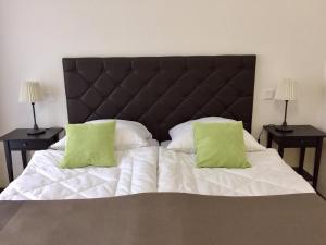 Кровать или кровати в номере Apartment am Zwingerteich