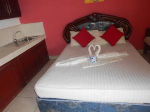 Postel nebo postele na pokoji v ubytování Shanith Guesthouse Negombo