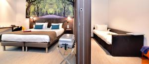 Cama ou camas em um quarto em Central Park Hôtel & Spa