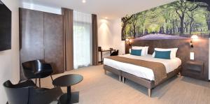 Cama ou camas em um quarto em Central Park Hôtel & Spa