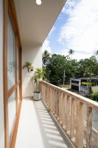 a balcony with a view of the street at Orchid Resort By Paradise in Habaraduwa Central
