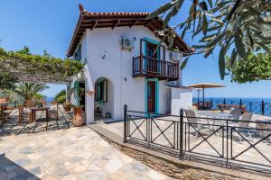 a villa with a view of the ocean at Villa Sea Horizon in Skopelos Town
