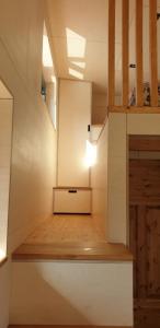 a small room with a staircase in a house at Tiny Frida in Gifhorn +41 photos