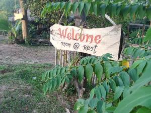 a sign that says welcome from your own rest at Kohyaonoi Lastfisherman in Ko Yao Noi +1 photo