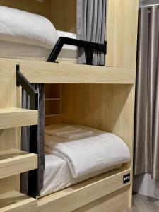 a couple of bunk beds in a room at Soulstay Bangkok in Bangkok