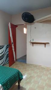 a room with a bedroom with a bed and a shelf at Varandas do mar II in Abade