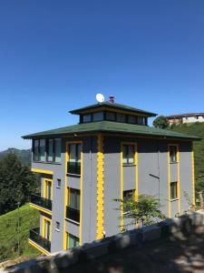 a building with a dome on top of it at Çolakoğlu konağı in Cayeli