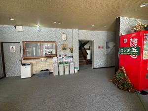 a room with a bunch of vending machines in a building at 苗場ロッヂ丘 in Yuzawa +81 photos