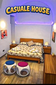 a bedroom with a bed and a castle house at Casuale House in Castel SantʼElia