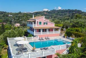 an aerial view of a house with a swimming pool at Villa Amalia By Elayan Villas Corfu in Karousádes