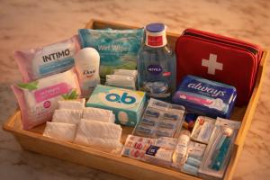 a tray filled with different types of medicines and a suitcase at Waves 342 Infinity in Mamaia Sat/Năvodari