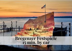 a picture of a pier with an american flag at CROWN LIVING Babylon Studios Lustenau - Studios nahe Messe und Schweizer Grenze, WLAN, kostenloser Parkplatz, Self Check-in, ideal für Geschäftsreisende und Feriengäste in Lustenau +22 photos