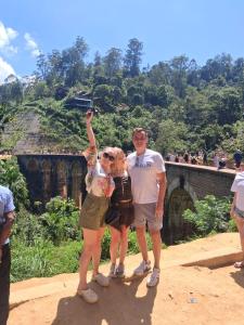 a group of three people posing for a picture at Villa Mossa Ambalangoda Boutique villa villa in Ambalangoda