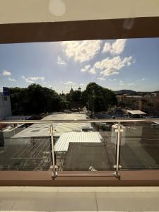 a view of a parking lot from a window at Moon Apartamentos D3 in San Cristóbal