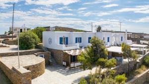 a villa with a view of a building at Socrates House Kythnos in Kithnos
