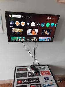 a tv with a screen on top of a box at Space in Cochabamba +9 photos